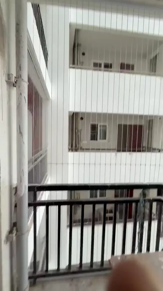 Invisible grill on a high-rise balcony