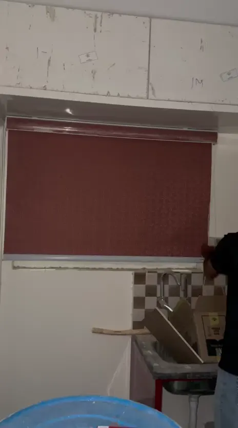 Roller blind for a kitchen window